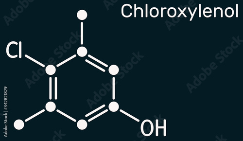 Chloroxylenol, C8H9ClO PCMX molecule. It is an antiseptic and disinfectant for skin disinfection and surgical instruments. Skeletal chemical formula on the dark blue background