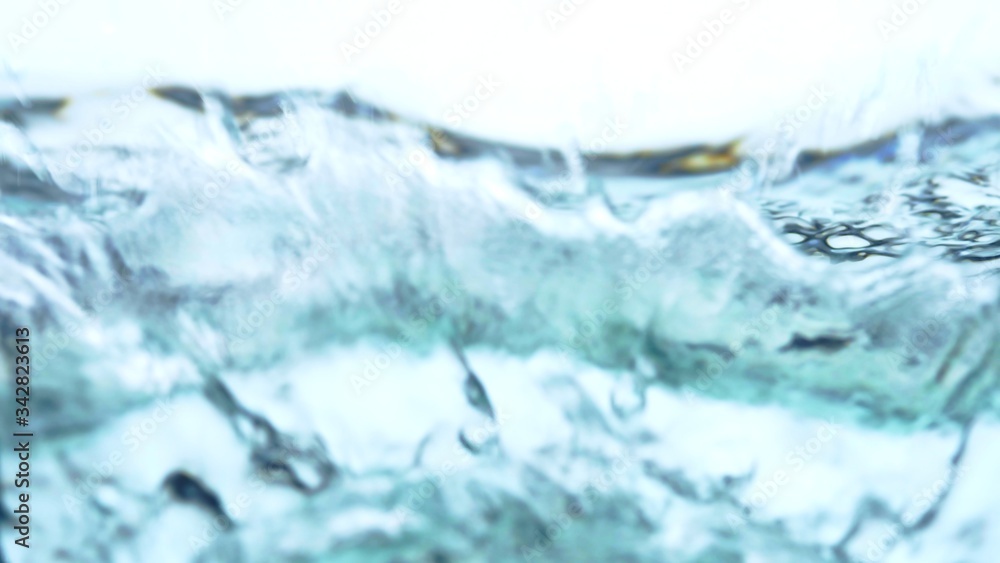 Soft blur focus of Abstract water splash surface filling the frame with the water drop and waving liquid with an air bubble on a white background and copy space.