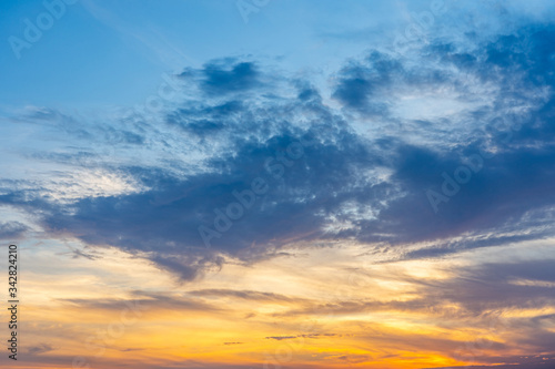Fototapeta Naklejka Na Ścianę i Meble -  Cumulus clouds on blue sky at sunset
