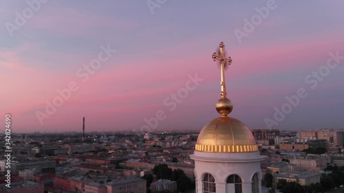 Amazing drone shots a seagull flying above the Trinity Cathedral at sunrise, Saint Petersburg, Russia photo