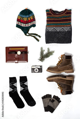 winter clothes and accessories on white