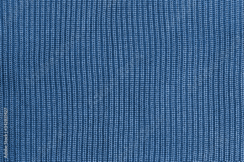 Blue knitted fabric texture background.