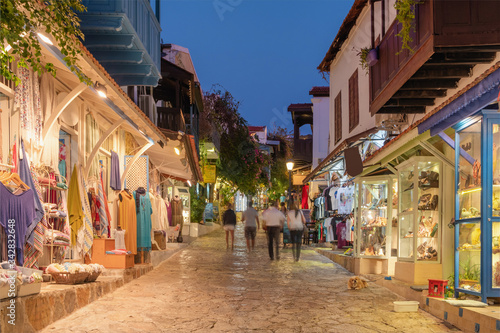 Street view in the Kas old town with boutique shops at evening  Turkey
