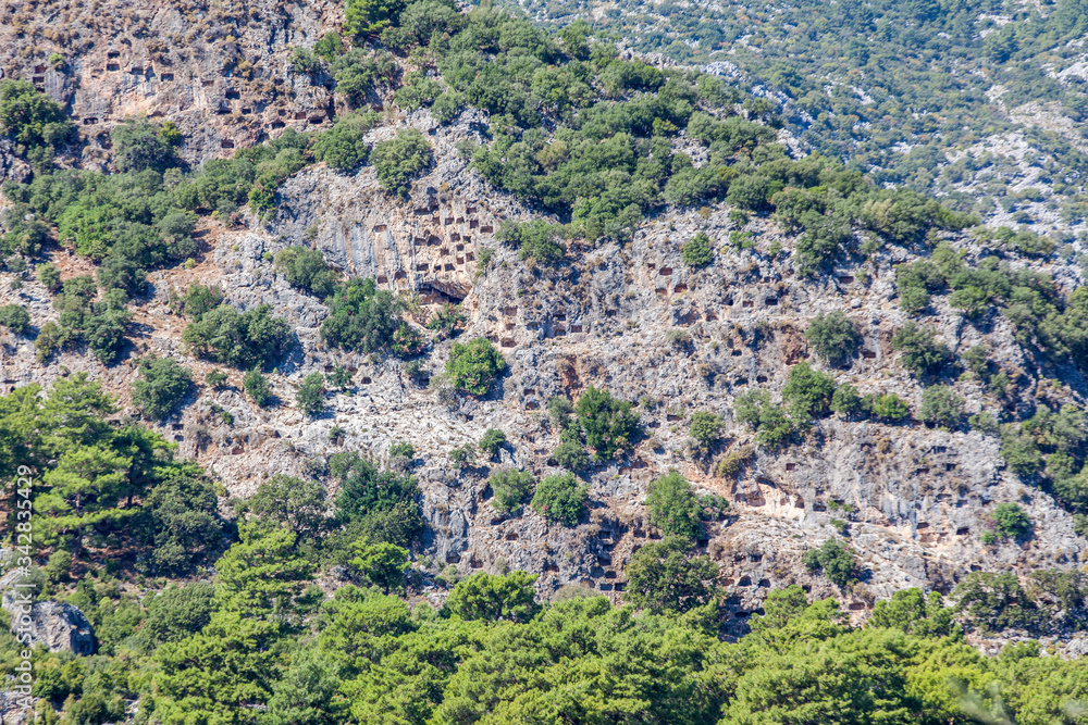 rock-cut tombs in the ancient city of Pinara in Fethiye city.