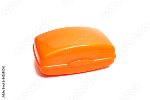 Photography Closed orange soap dish isolated on white background