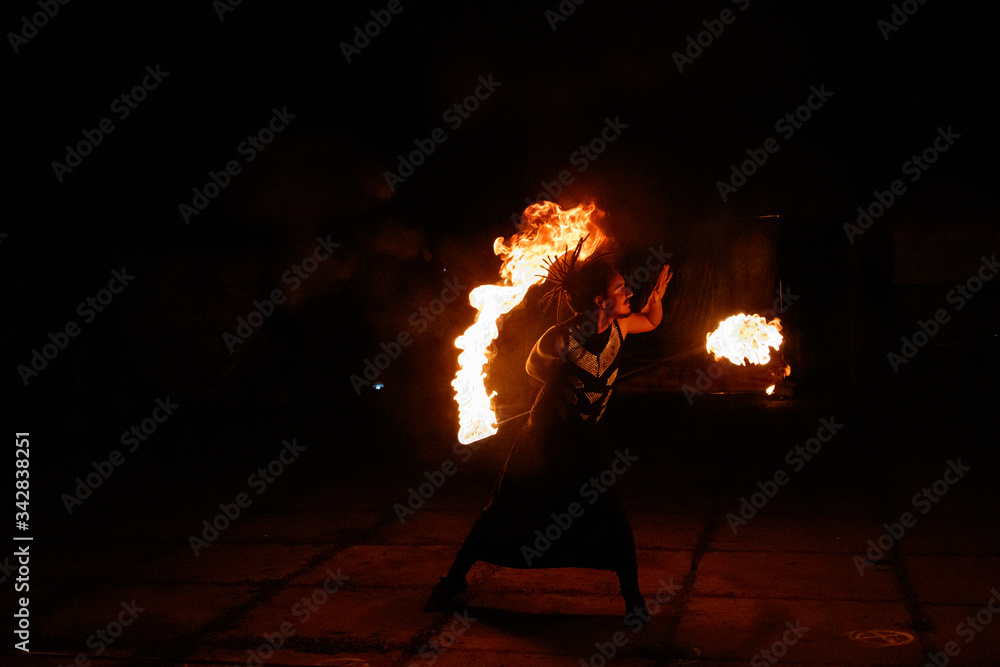 Fototapeta premium Fire show, rotation of fire