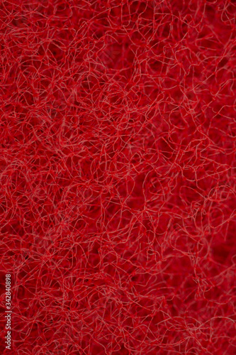 Close-Up Of red Cleaning Sponge