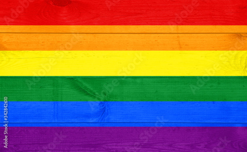Gay pride flag painted on wooden pad