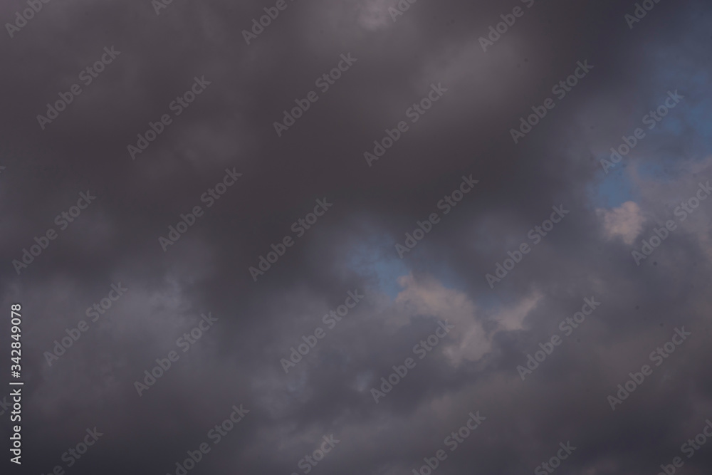 Beautiful clouds roaming in the red and bluish sky during sunset in the afternoon. Indian landscape and sky. Beautiful clouds roaming in the red and bluish sky during sunset in the afternoon. Indian landscape and sky.
