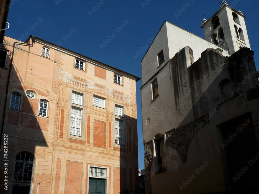 Fototapeta premium Beautiful corner with Renaissance palace and medieval church. City of Genoa. Liguria. Italy.