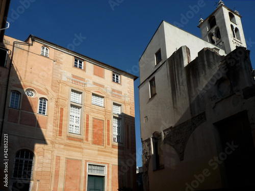 Beautiful corner with Renaissance palace and medieval church. City of Genoa. Liguria. Italy.