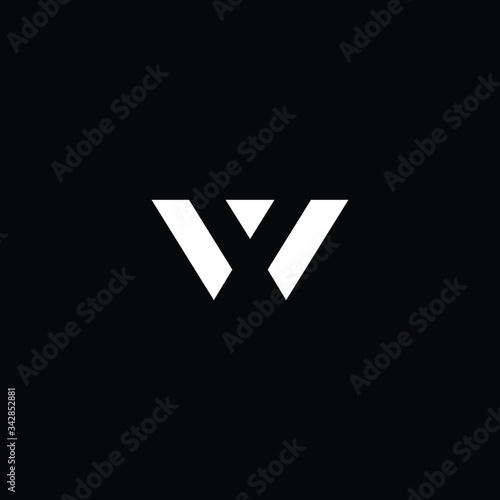 Minimal elegant monogram art logo. Outstanding professional trendy awesome artistic W WV WX XW initial based Alphabet icon logo. Premium Business logo White color on black background photo