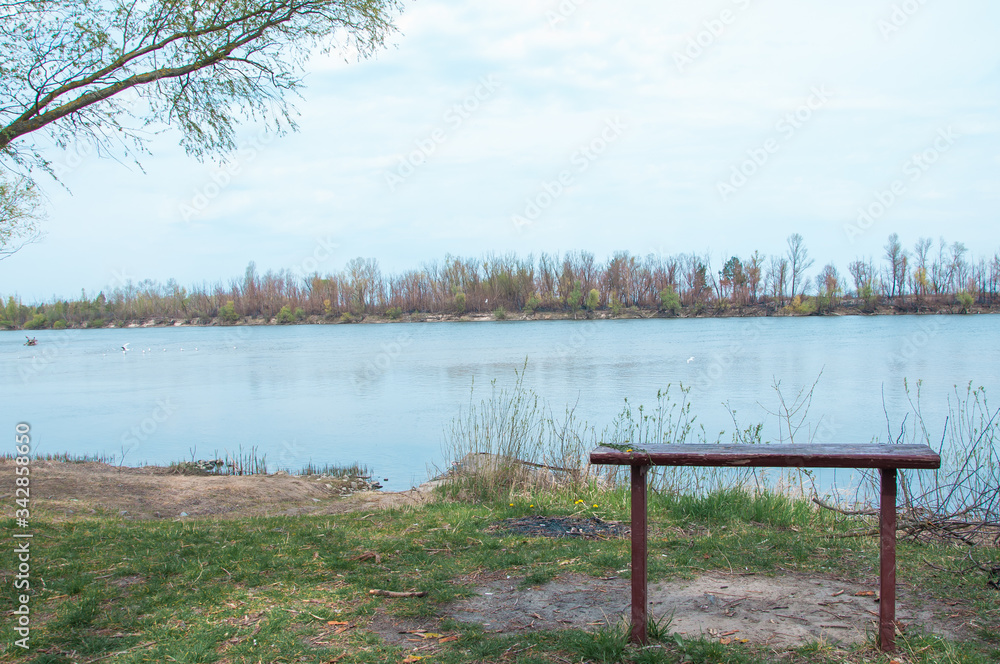 lonely bench on the river side