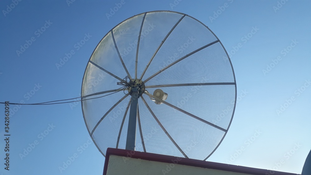 satelite dish on top the building