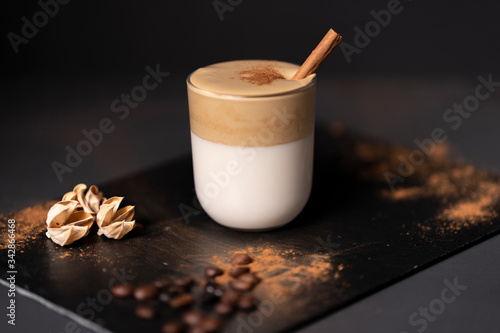 Dalgona coffee, soft, sparkling coffee with milk and a touch of cinnamon