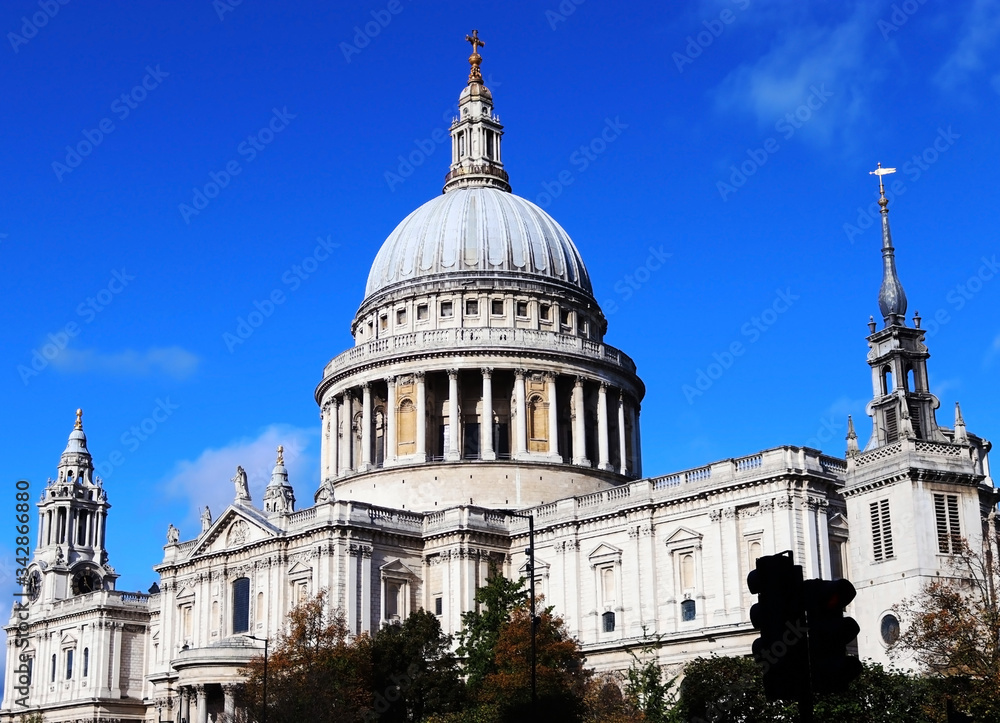 St Pauls from a side view angle in London with sunny sky.