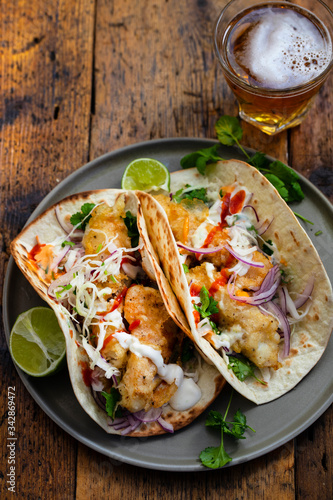 Mexican fish tacos with cabbage and garlic mayo