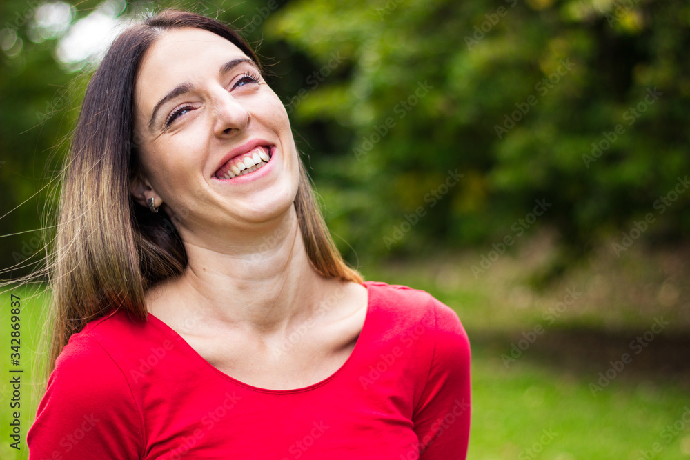 Laughing woman enjoying freedom outdoors Laughing woman enjoying freedom outdoors