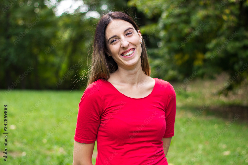 Laughing woman enjoying freedom outdoors Laughing woman enjoying freedom outdoors