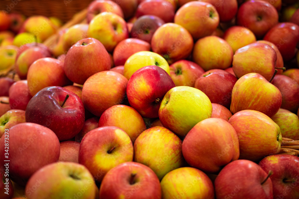 red gala apples on the supermarket counter background red gala apples on the supermarket counter background