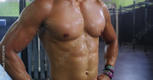 Strong asian man sweaty after workout