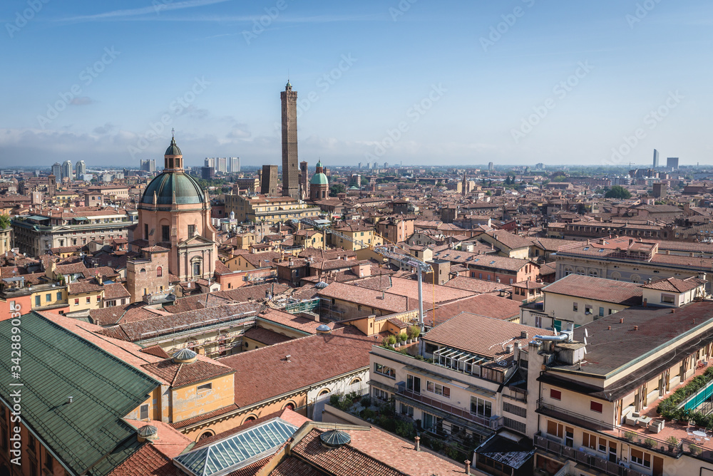 Old town of Bologna city, Italy seen from terrace of St Petronius basilica, view with Two Towers and Santa Maria della Vita church