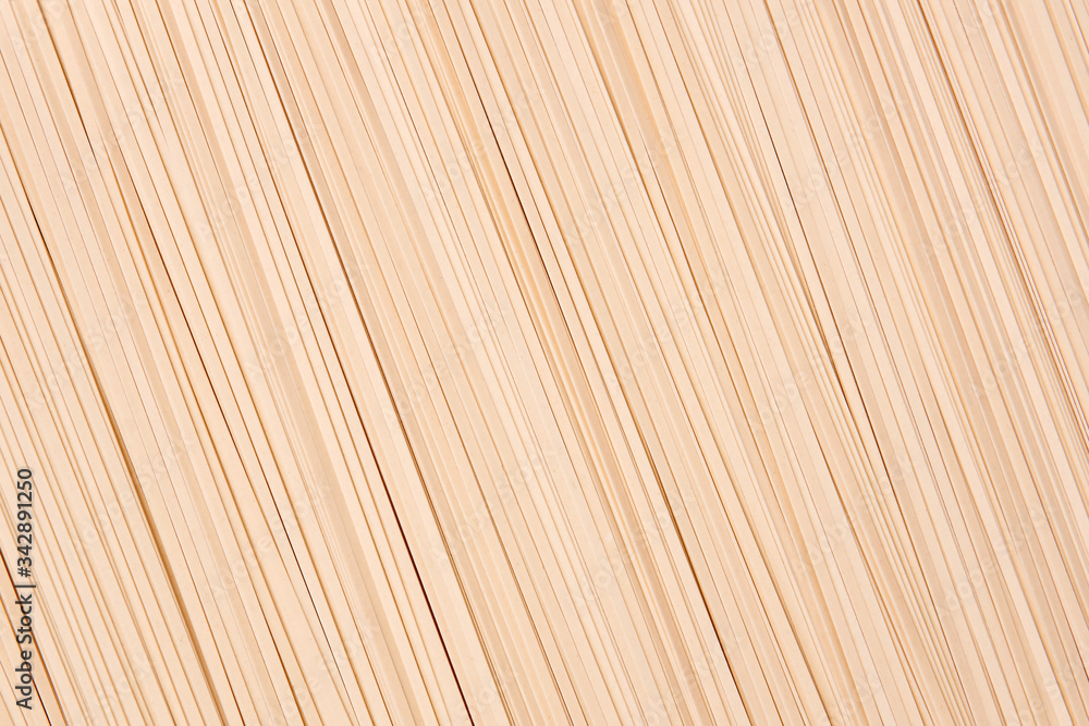 background of dried udon, thin noodles made from wheat flour background of dried udon, thin noodles made from wheat flour