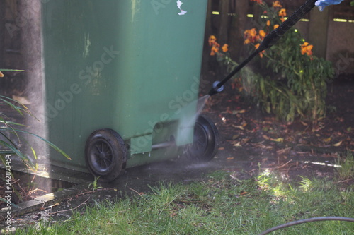 jet washing the wheely bin  photo