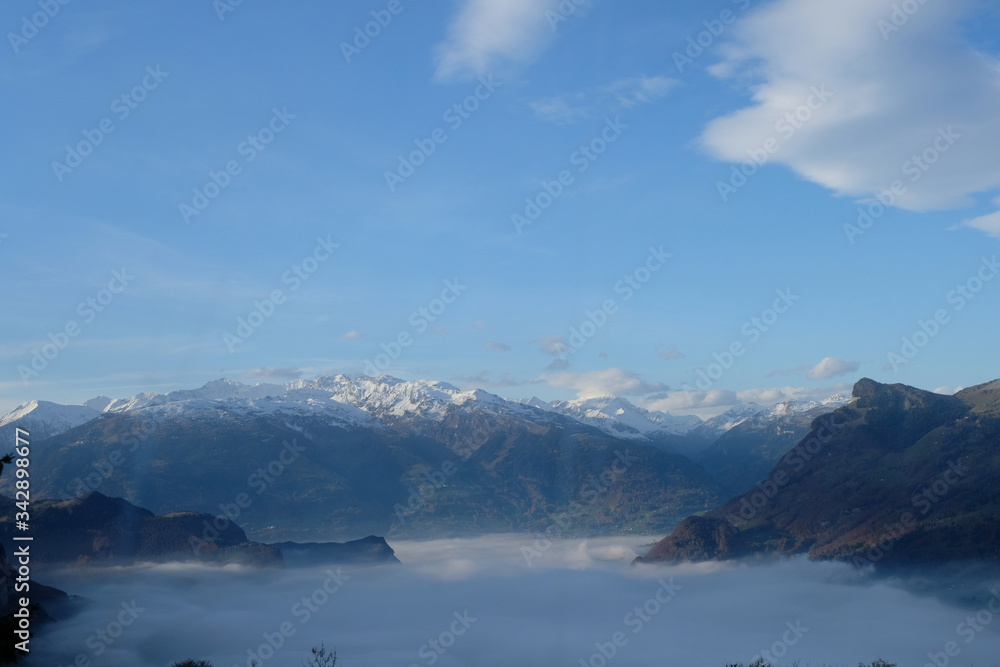 Foggy view of Alps on the way from Malbun to Vaduz in Liechtenstein
