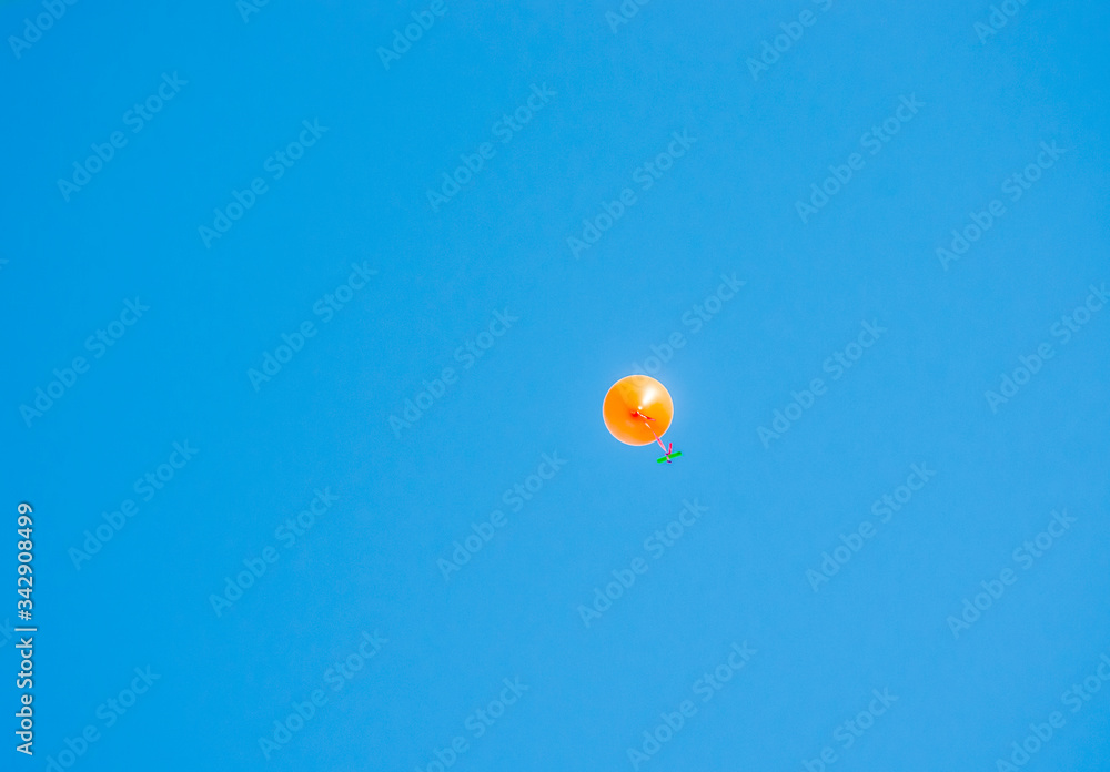 colorful balloons flying in the blue sky with message written by children colorful balloons flying in the blue sky with message written by children