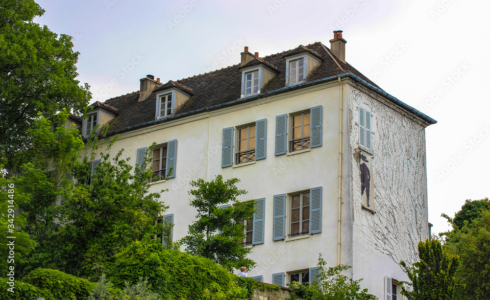 Beautiful white house in Paris: European architecture, building where Parisians live