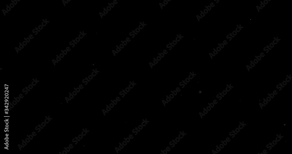 abstract Flying dust particles on a black background abstract Flying dust particles on a black background