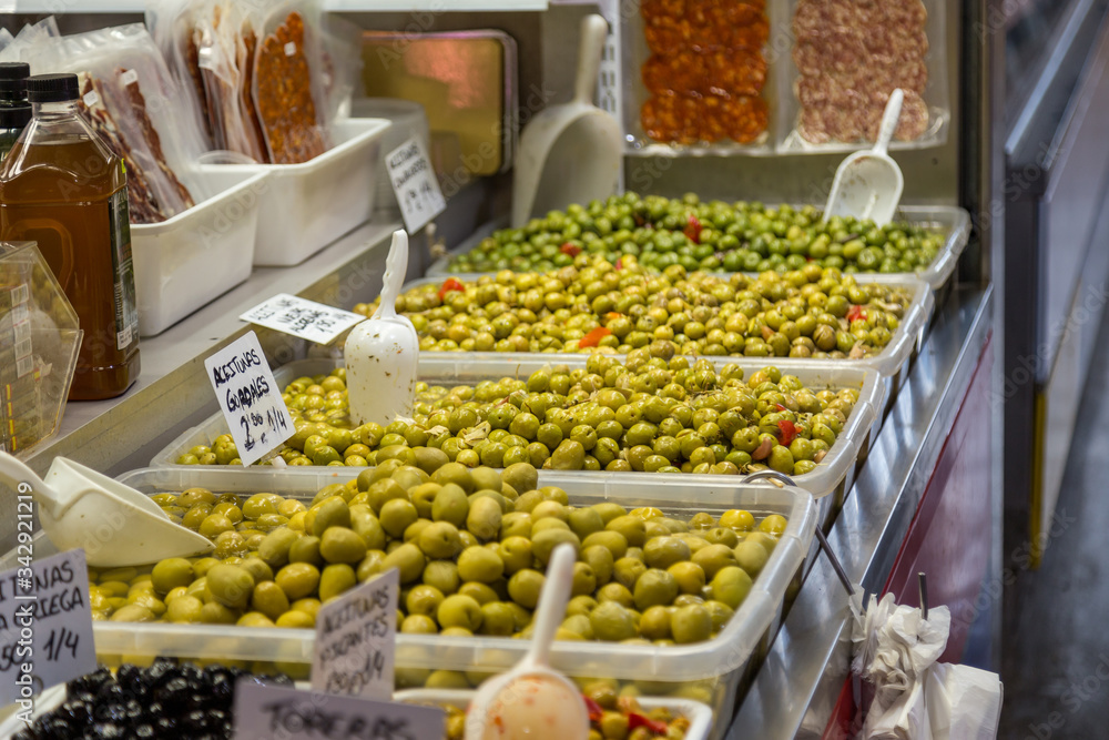 An olive bar in the farmers market found while traveling in Malaga, Spain.