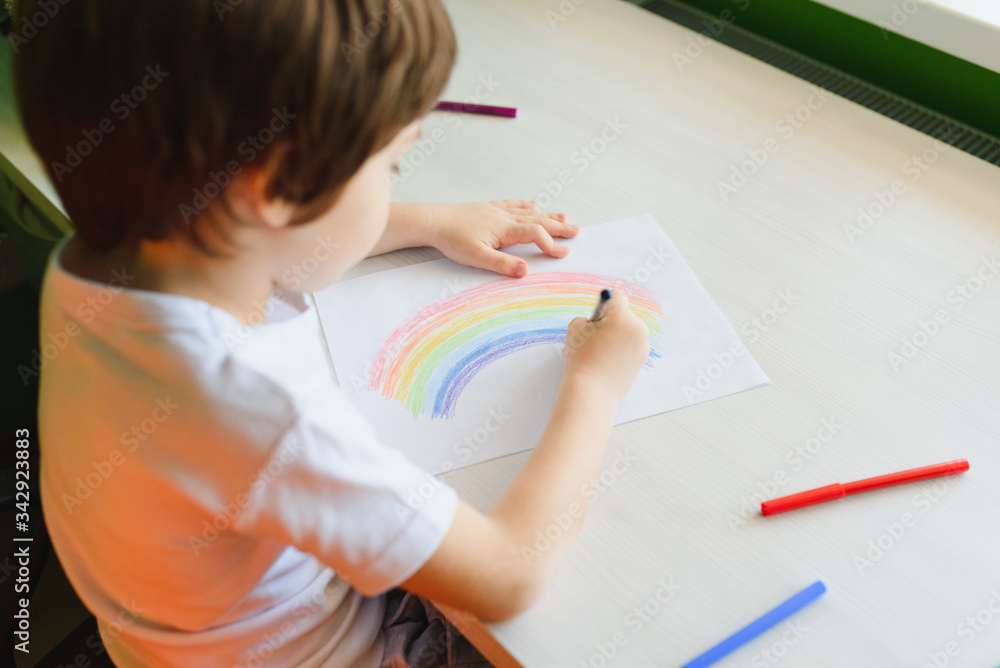 Child's Drawing Depicting Colorful rainbow.Stay at Home Social Media Campaign For Coronavirus Prevention, Let's All Be Well, Hope During Coronavirus Pandemic Concept Child's Drawing Depicting Colorful rainbow.Stay at Home Social Media Campaign For Coronavirus Prevention, Let's All Be Well, Hope During Coronavirus Pandemic Concept