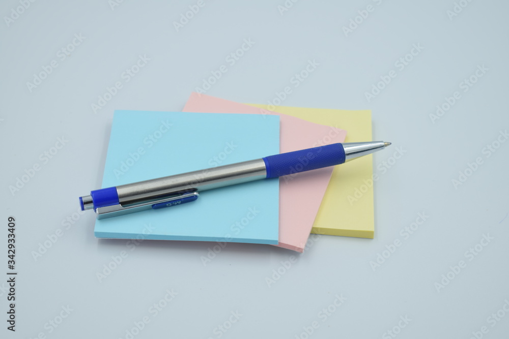 colorful sticky notes with pen on white background colorful sticky notes with pen on white background