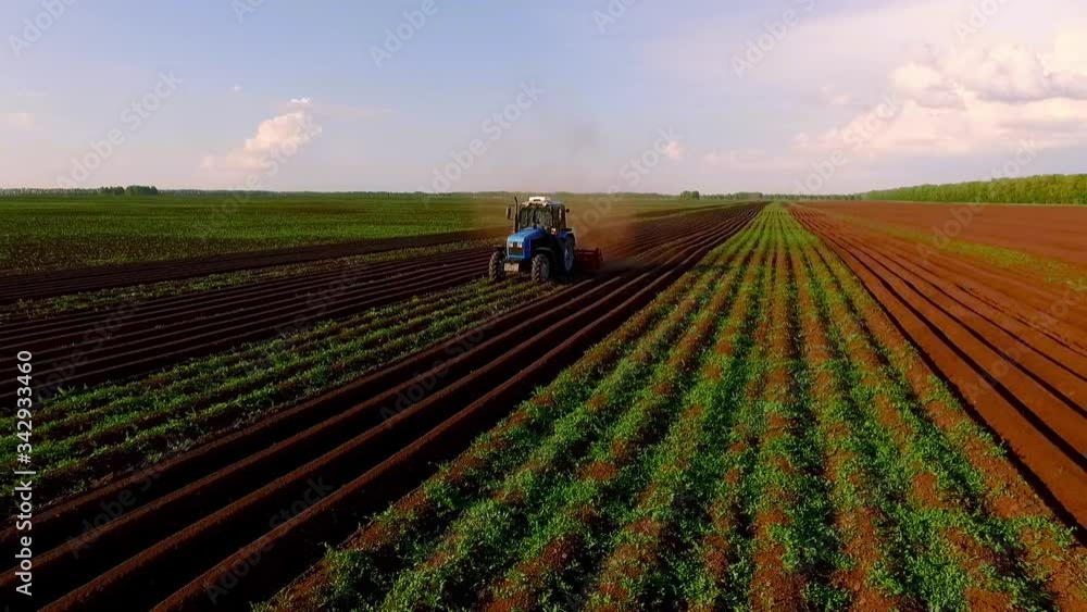 bird view two tractor on ploughed field bird view two tractor on ploughed field