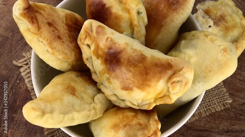 Homemade Empanadas on a rotating plate (seamless loopable)