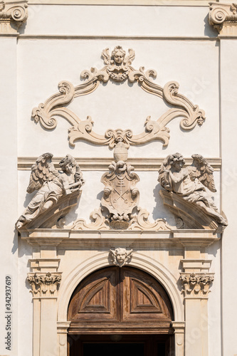 Stone angels on the facade of a medieval church. © isaac74