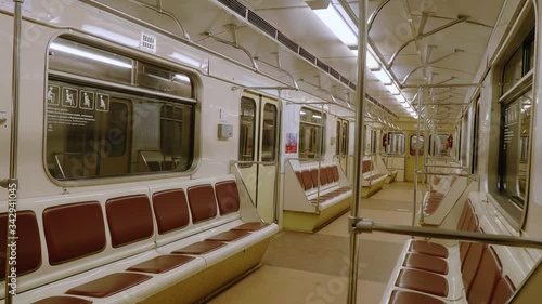Subway car of train approaches metro station and stops. Empty subway car of metri train in Moscow.