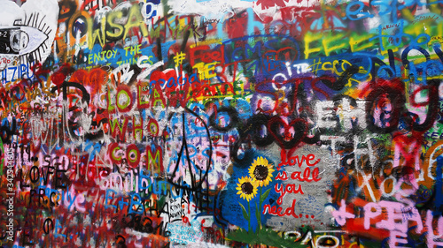 Bright colorful John Lennon's wall with graffiti in Prague