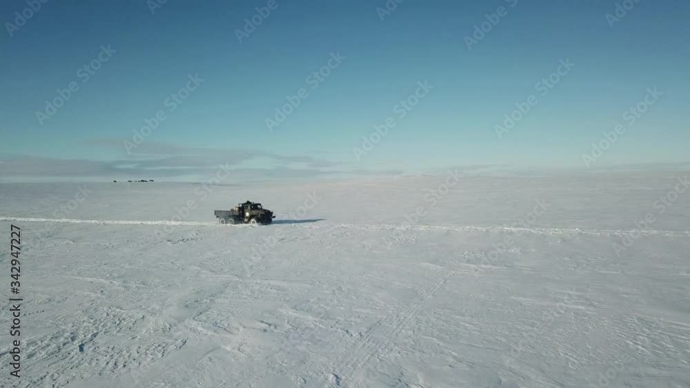 Field camp of geologists in the tundra of the Republic of Sakha. Frozen Surface at Packice Top Flight Drone Shot Footage 4K (UHD) Field camp of geologists in the tundra of the Republic of Sakha. Frozen Surface at Packice Top Flight Drone Shot Footage 4K (UHD)