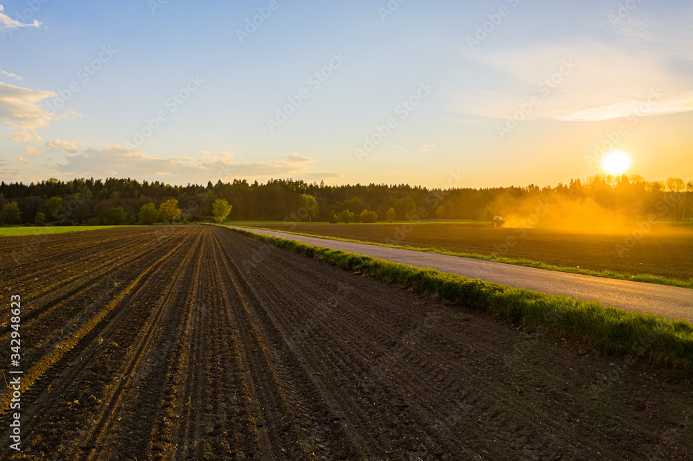 Plowed field in rural area. Landscape of agricultural fields