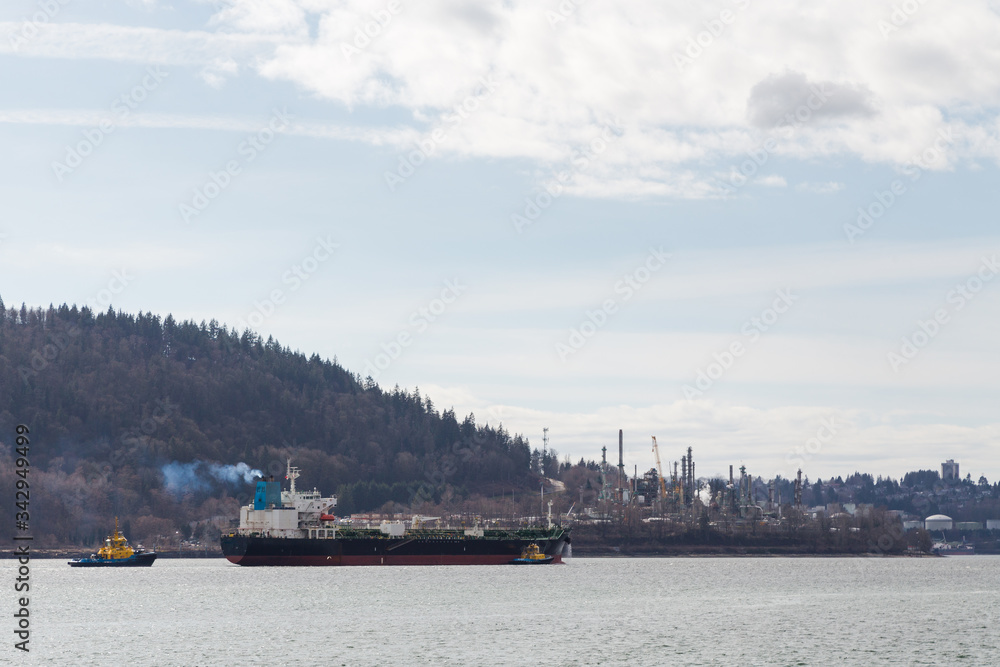 Aerial shot of a oil tanker in Burrard Inlet with near the Parkland refinery.
