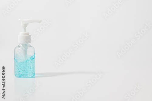 White pump bottle of hand sanitizer gel in  isolated on a white background. Sanitizer gel for corona virus or Covid 19 protection.