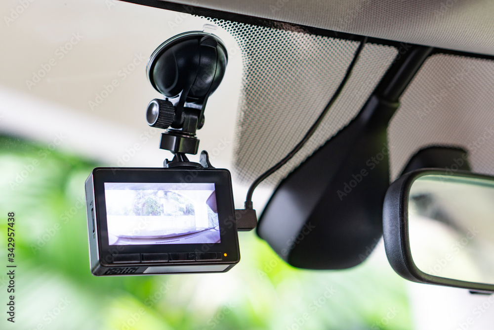 car camera video recorder to capture and record traffic pedestrian and potential road accident, technology recorder device capturing video of front of vehicle automobile crash safety proof evidence