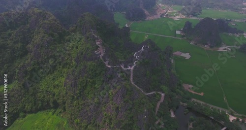 Aerial view of Tam Coc Bich Dong, part of the Trang An Scenic Landscape Complex UNESCO World Heritage site, Ninh Binh. Tam Coc is a flooded cave karst system, Bich Dong is a series of moutain pagodas photo