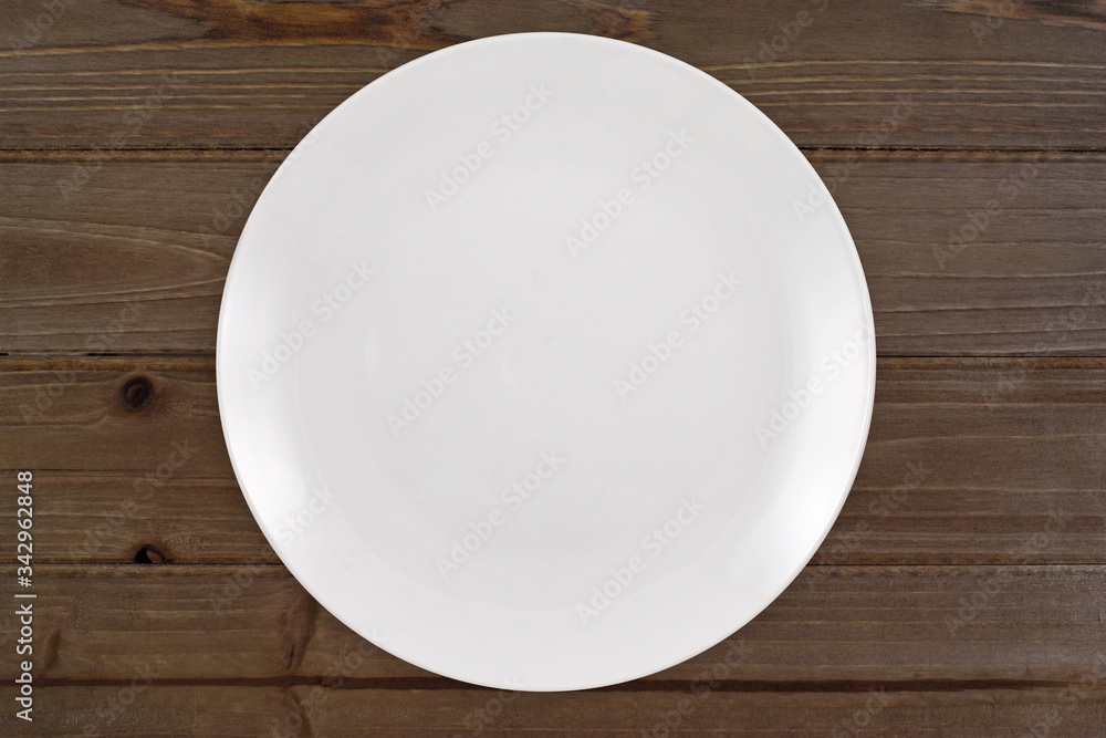 Round White Plate Mockup on Rustic Weathered Table Round White Plate Mockup on Rustic Weathered Table