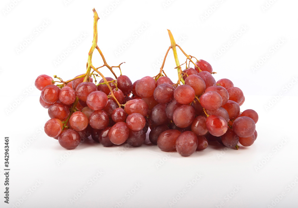 Fototapeta premium fresh red grapes isolated on white background.