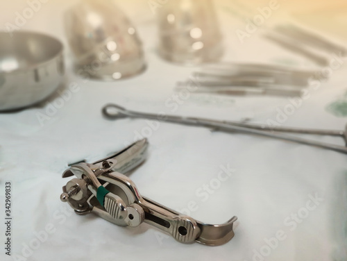 close up of metal speculum and blur background.