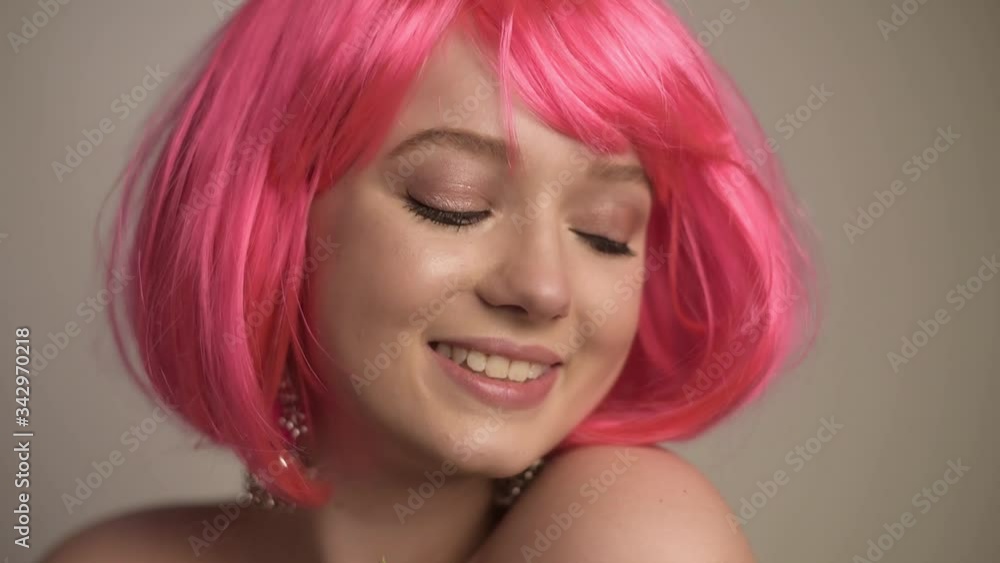 Girl with inflorescences, spring, portrait, beautiful model with a pink flower, sprouts, buds. inherits the beginning of spring. Delicate pink makeup inspired by flowers. Pink hair Girl with inflorescences, spring, portrait, beautiful model with a pink flower, sprouts, buds. inherits the beginning of spring. Delicate pink makeup inspired by flowers. Pink hair
